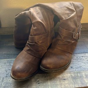 Brown knee high boots with side zipper